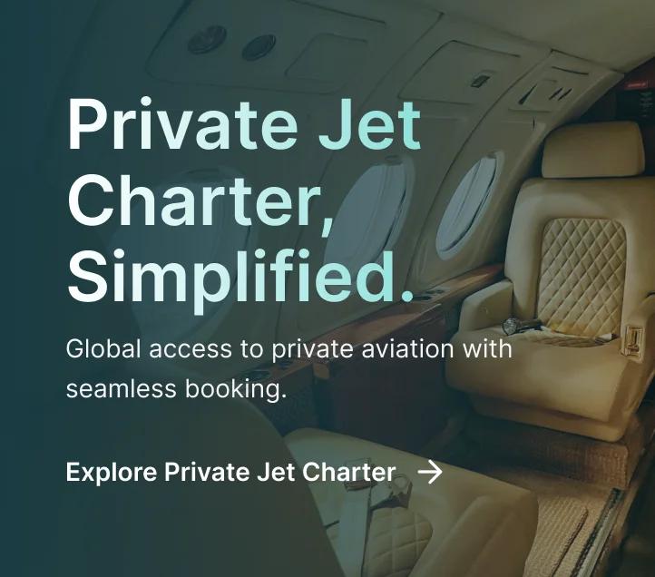 Luxurious private jet cabin interior with cream leather seats and polished wood finishes